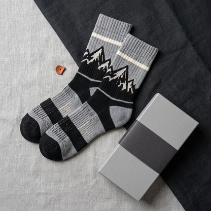 Gray black mountain socks overhead hero